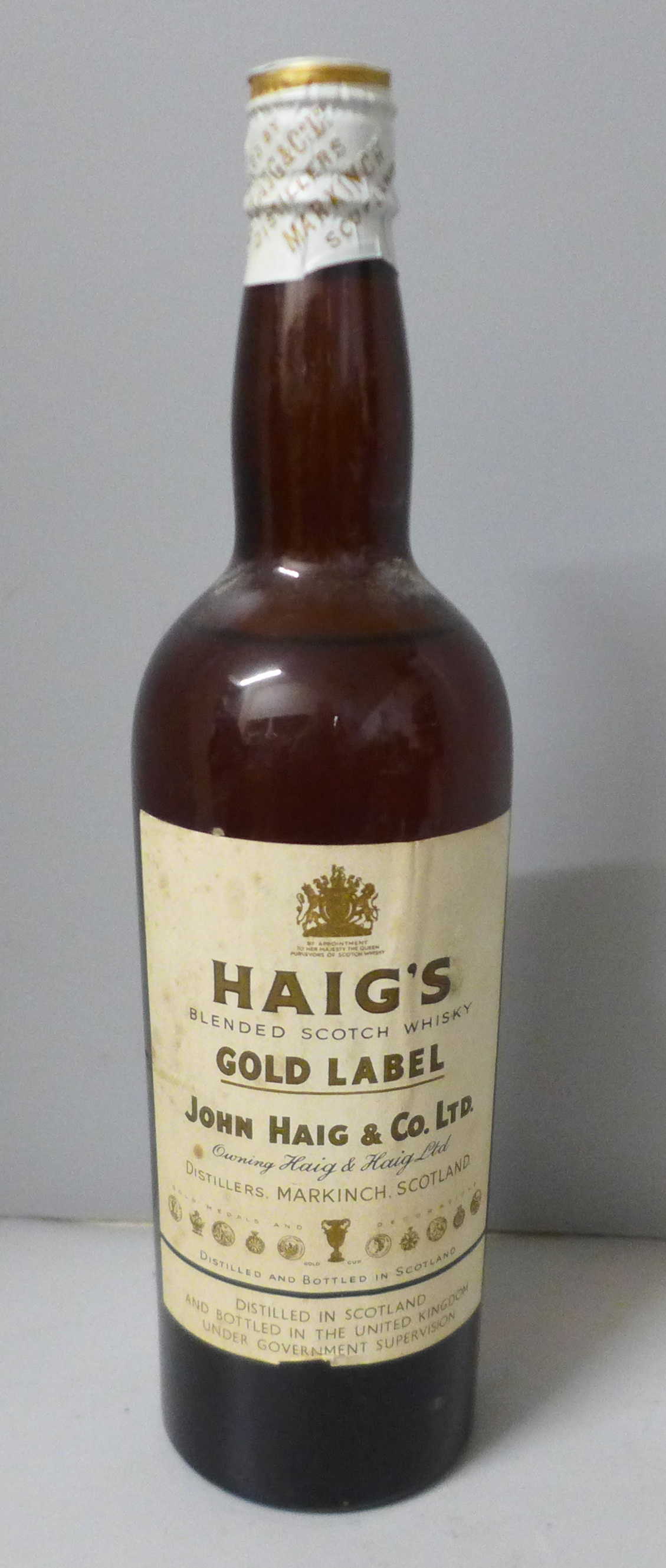 A Haig's Gold Label bottle of whisky