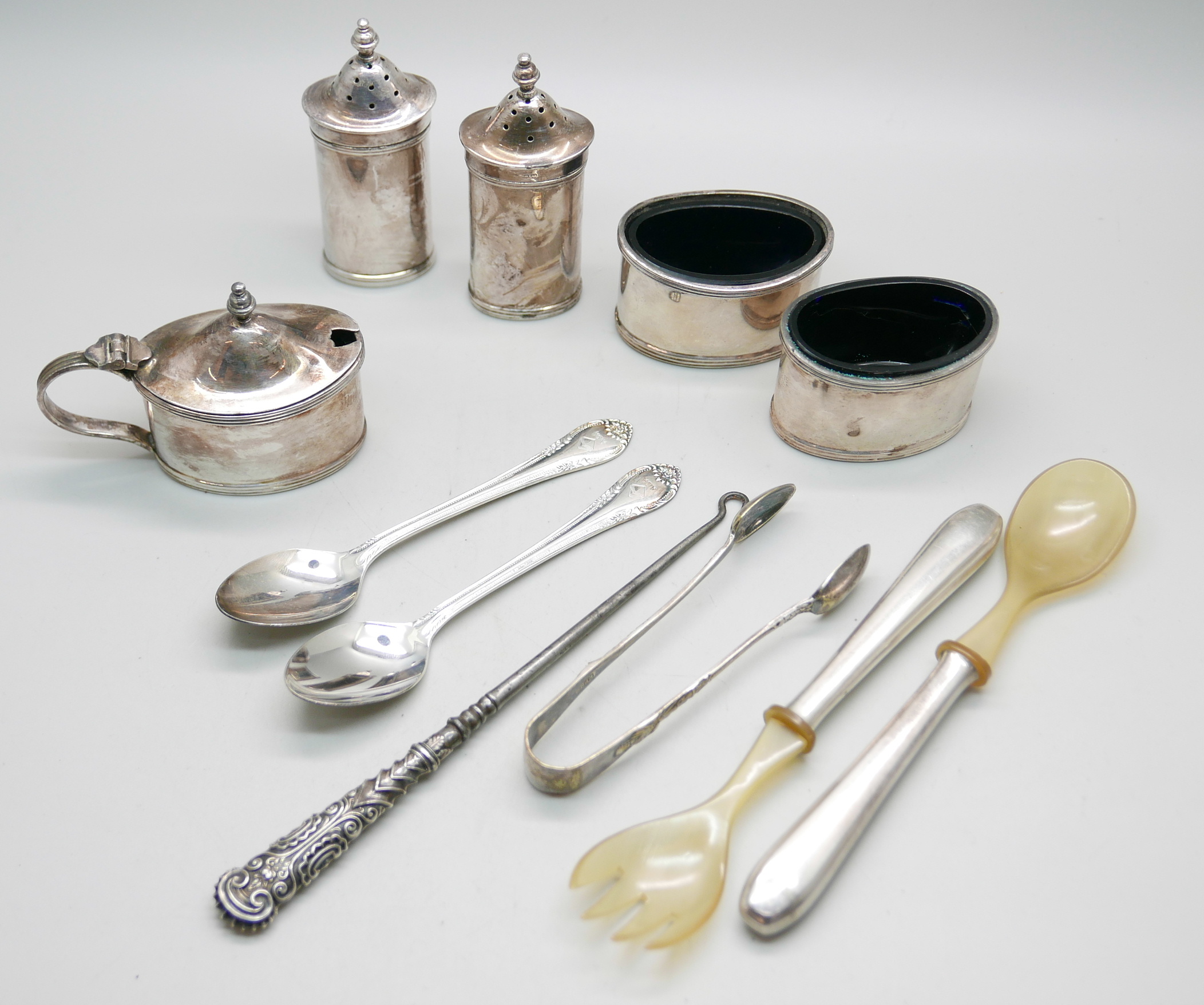 Five silver condiments, two silver spoons and two small servers, horn and white metal mounted marked