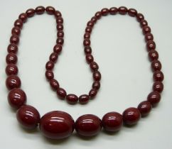 A string of sherry amber beads, 75.5g