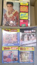 A collection of Elvis Presley LP records and cine-films