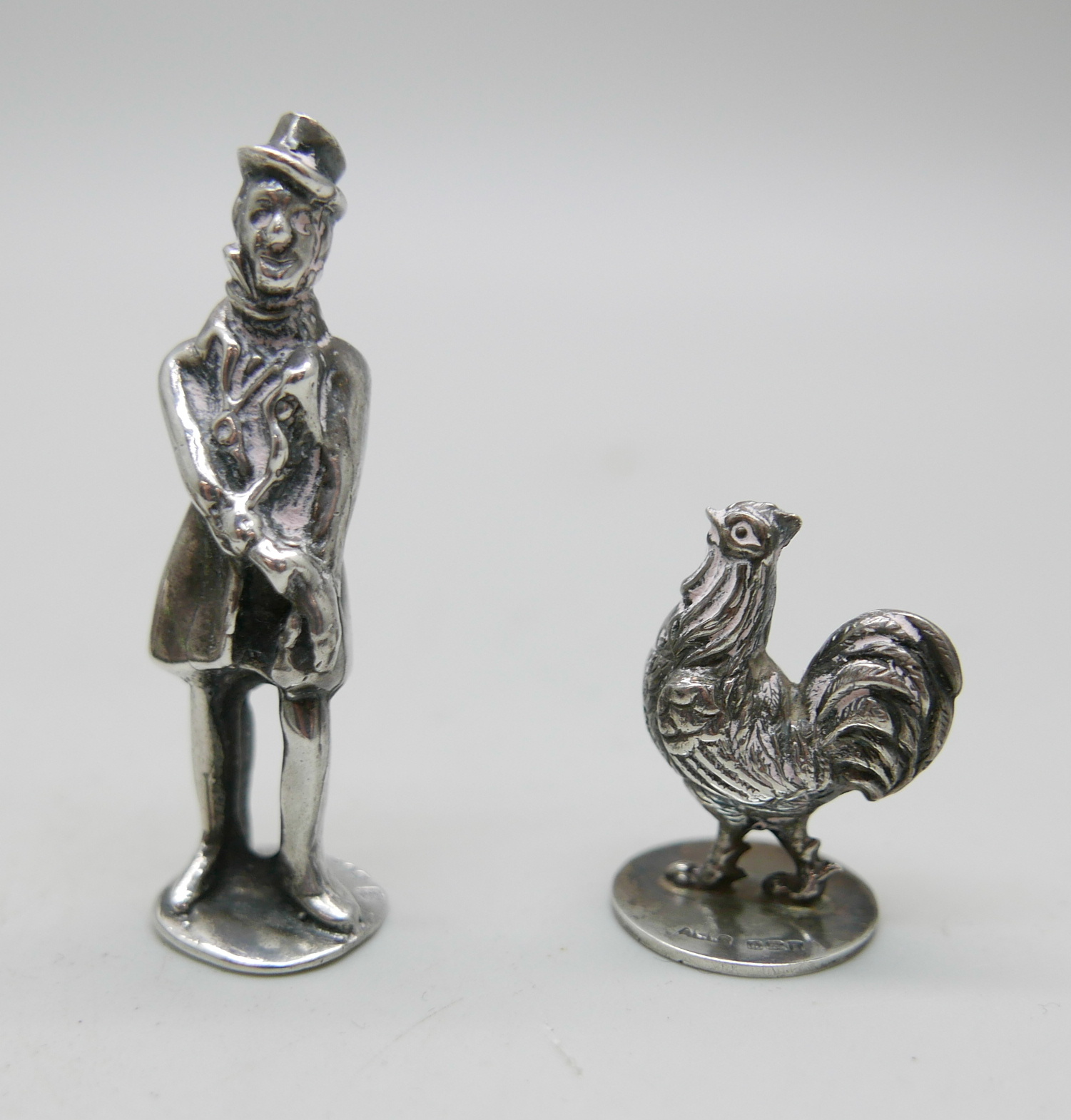 An enamel and silver topped scent bottle, a/f, two hallmarked silver models, a gentleman and a - Image 2 of 6