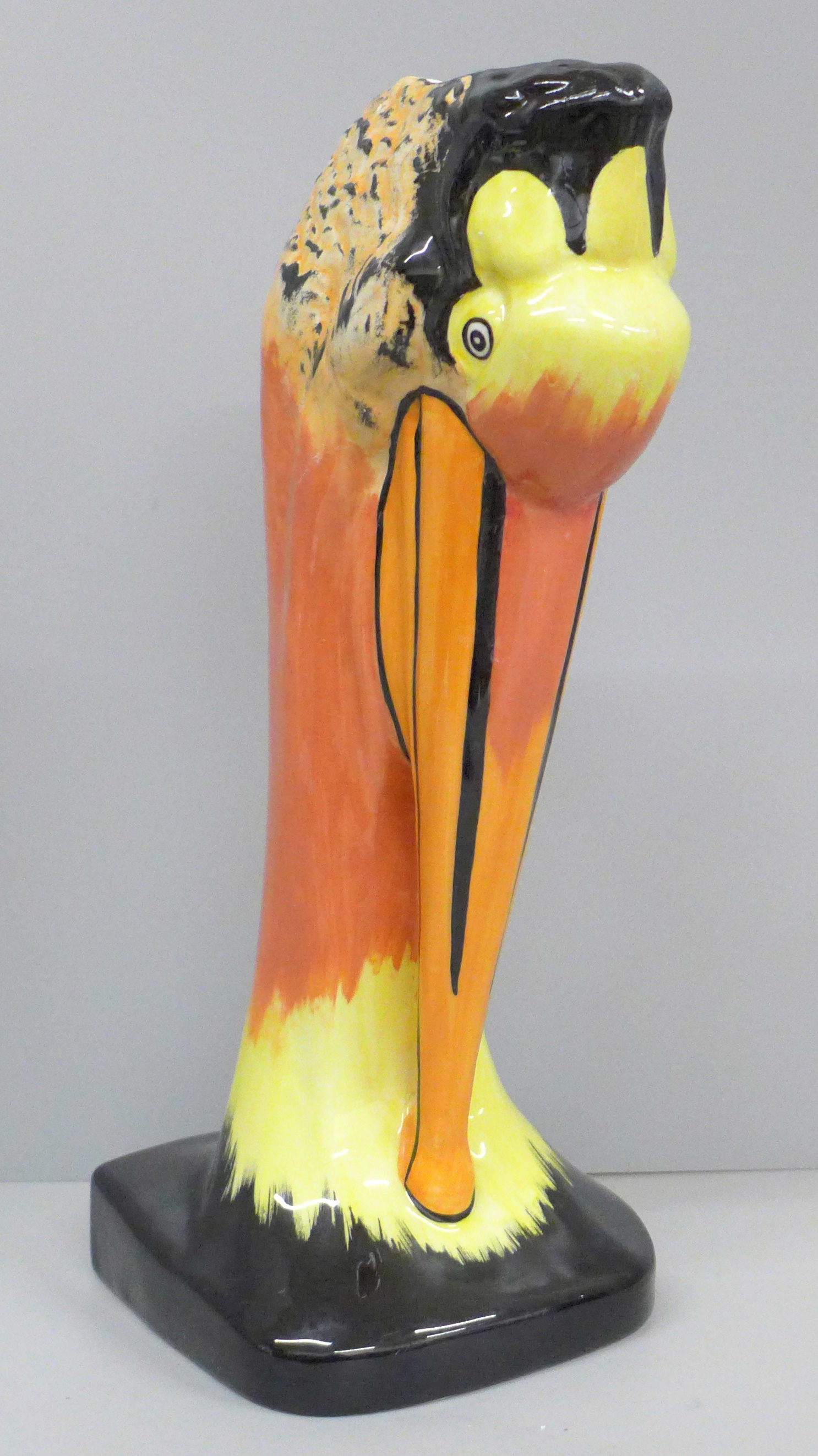 A Lorna Bailey stork vase, rim restored, signed to base, 30cm