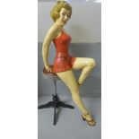 A Jun Asilo Marilyn Monroe composition figure sat on a bar stool, 66cm