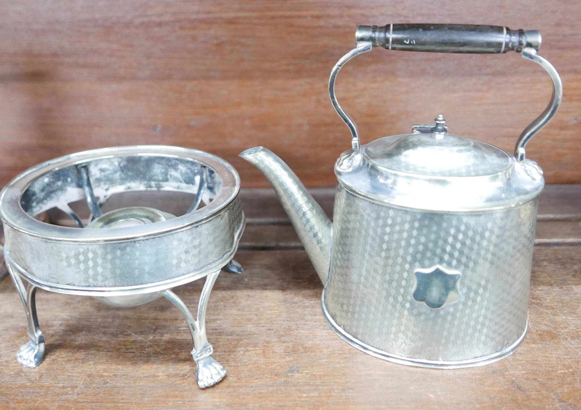 A silver plate coffee pot on stand, on paw feet and crest plate and a pair of plated candlesticks - Image 3 of 4