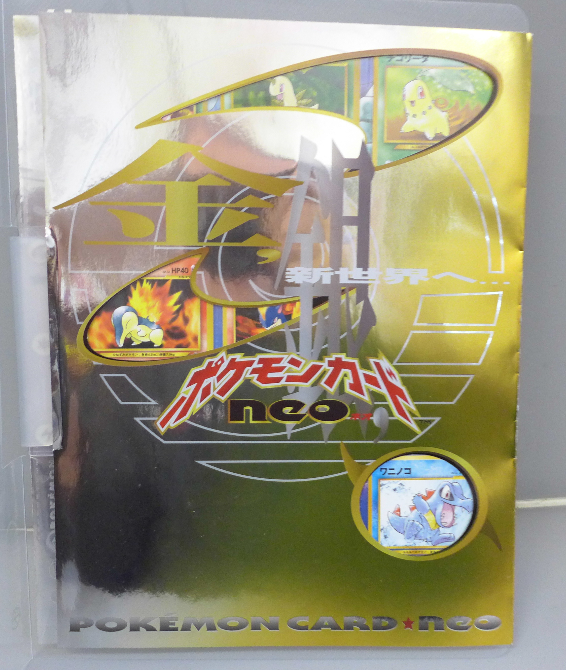 A booklet of Neo Pokemon cards