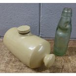 A glass cod bottle, J.J. Mettham, Mansfield and a hot water bottle