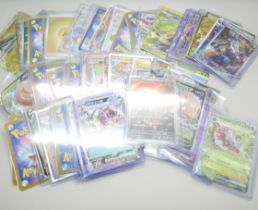 A collection of approximately 95 Pokemon cards