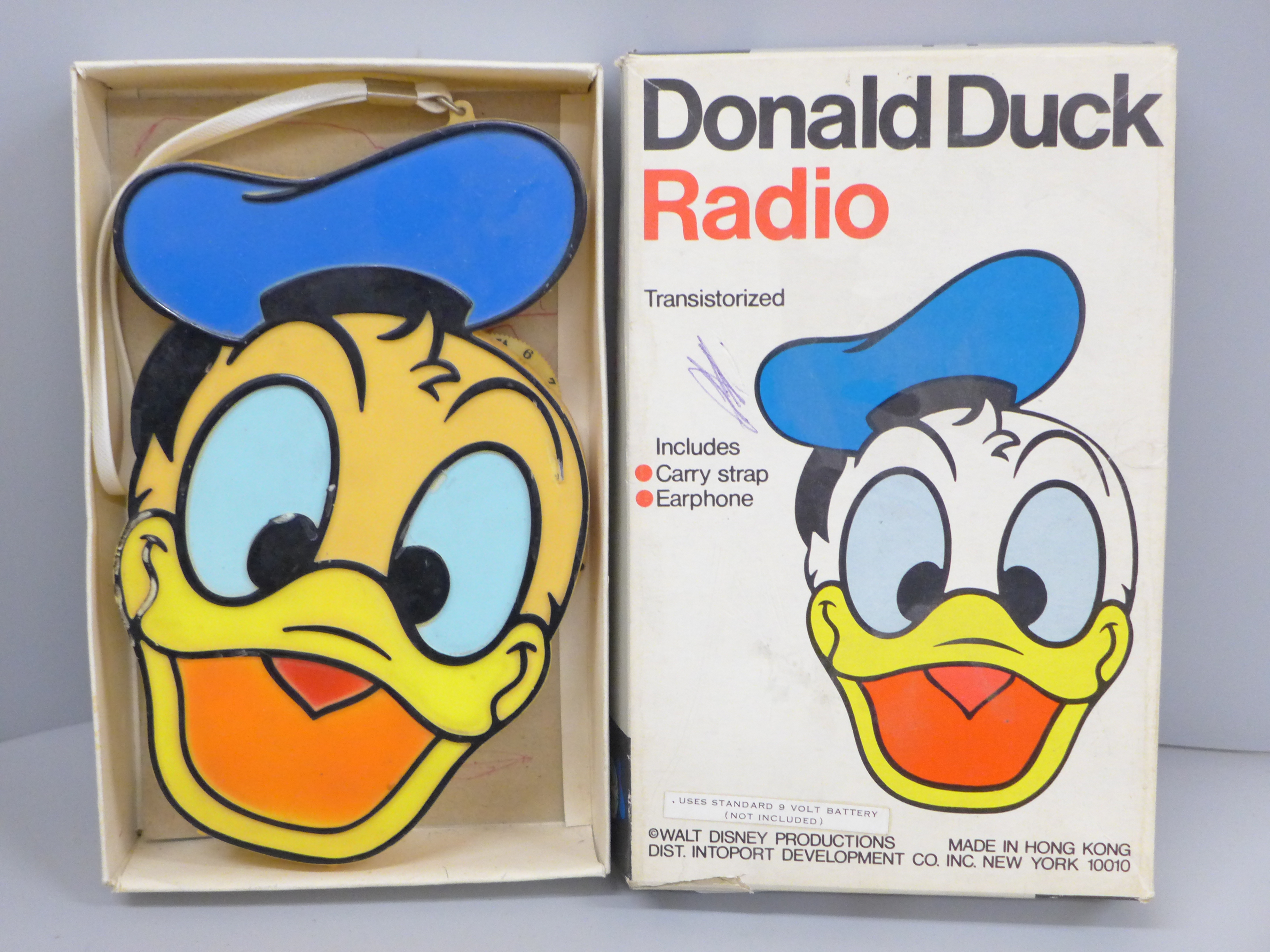 A Donald Duck transistor radio in original box, tested, not working