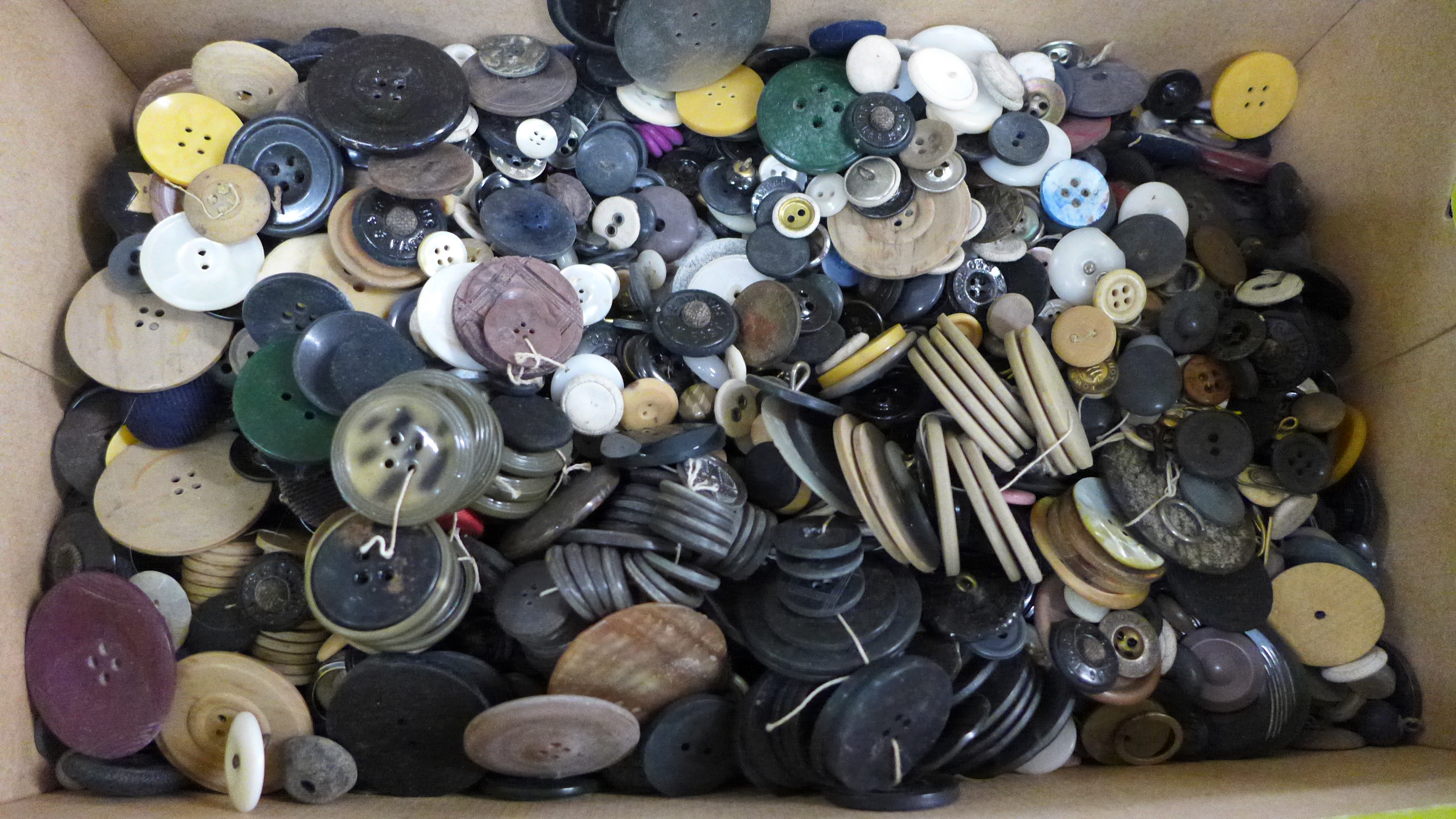 A box of vintage buttons