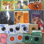 A collection of records from artists; Roy Orbison, Neil Sedaka, The Hollies and The Everly Brothers,