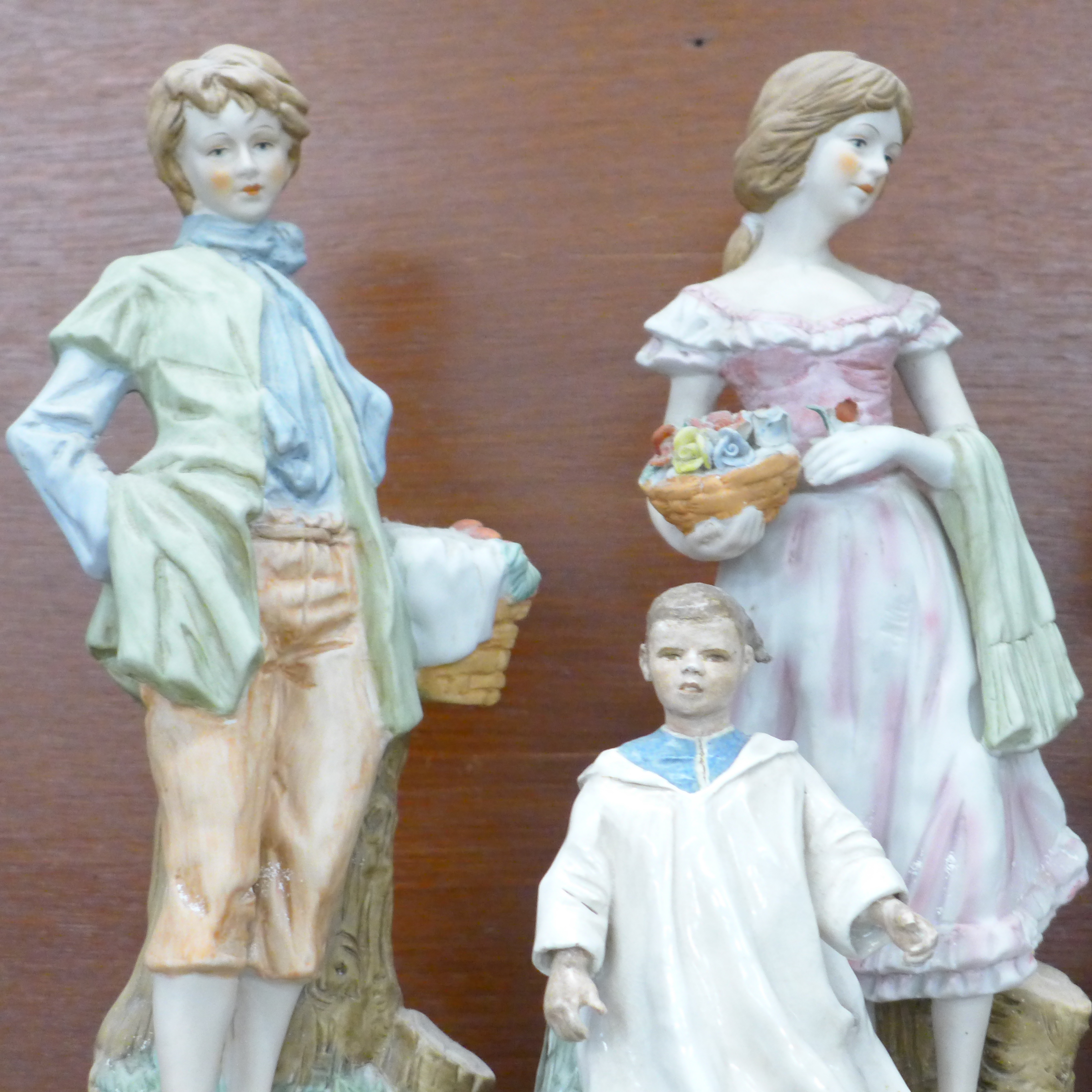 A cherub porcelain mantel clock, a hand painted porcelain ceramic Johnny Appleseed figure, hand - Image 2 of 3