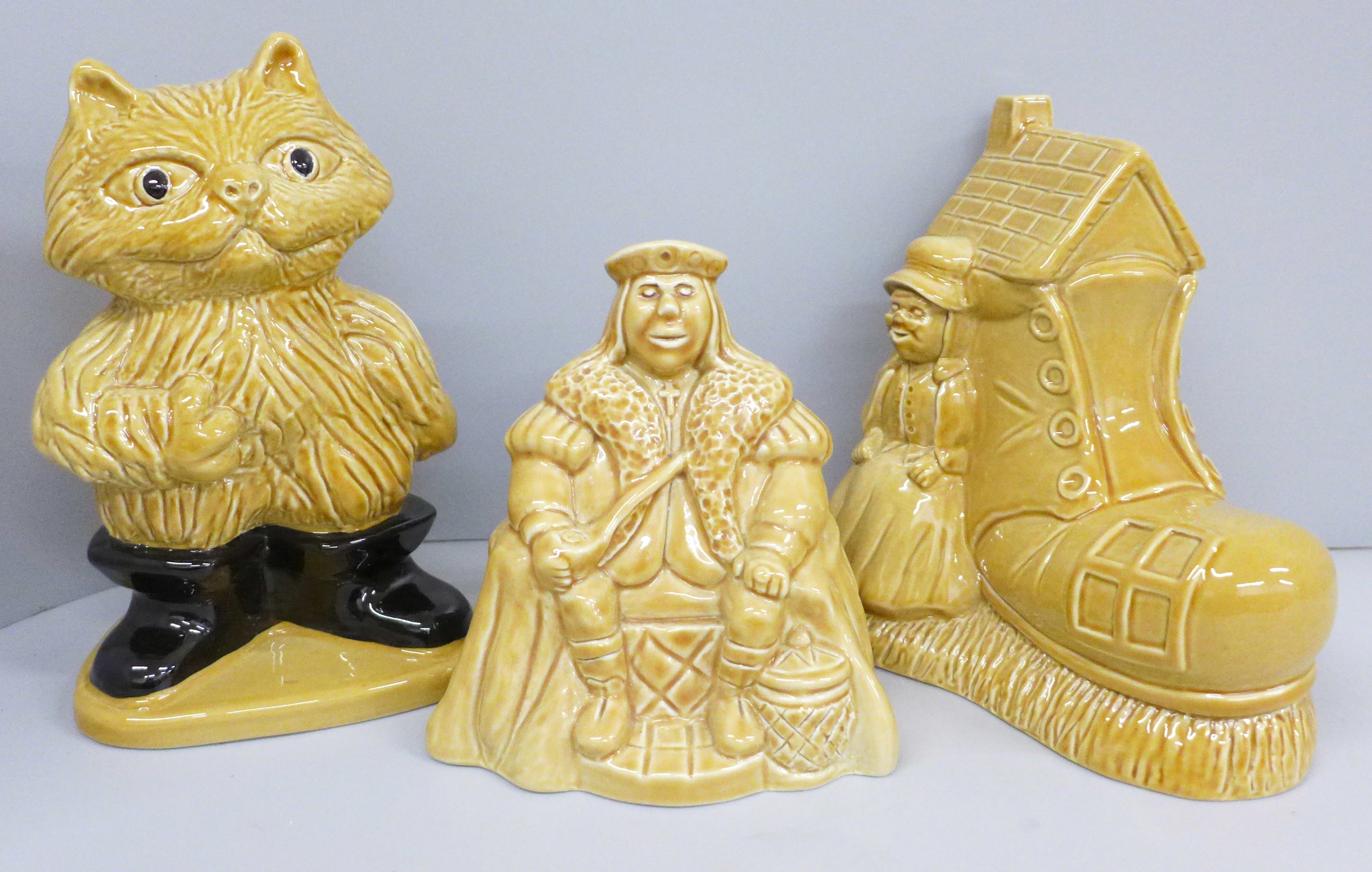 Three Wade nursery rhyme money boxes, Old King Cole, Puss In Boots, Old Woman in Shoe
