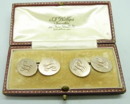 A pair of 9ct gold cufflinks, cased, 9.6g