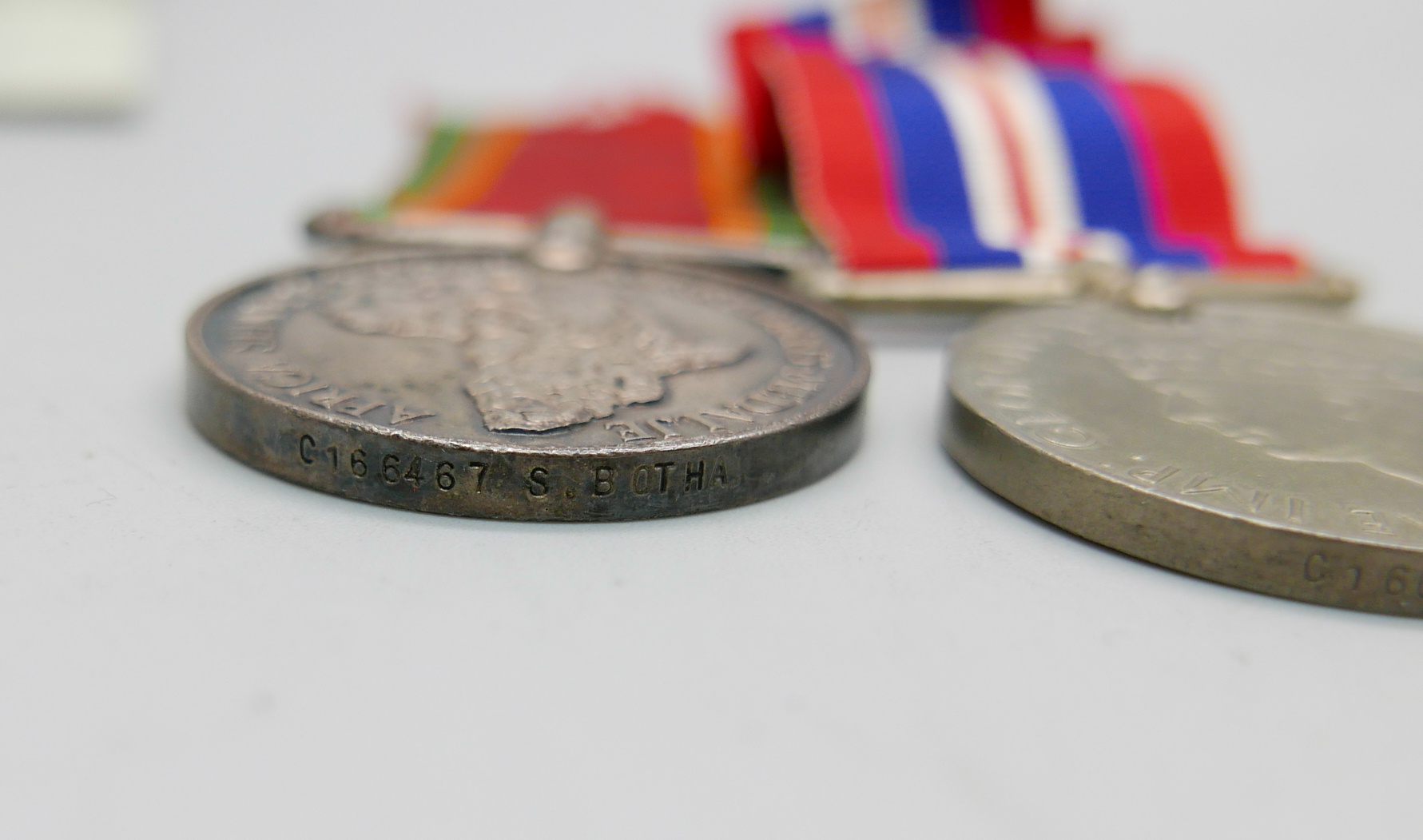 Four WWII medals including Africa Service Medal to C166467 S. Botha and leaflet - Image 3 of 4