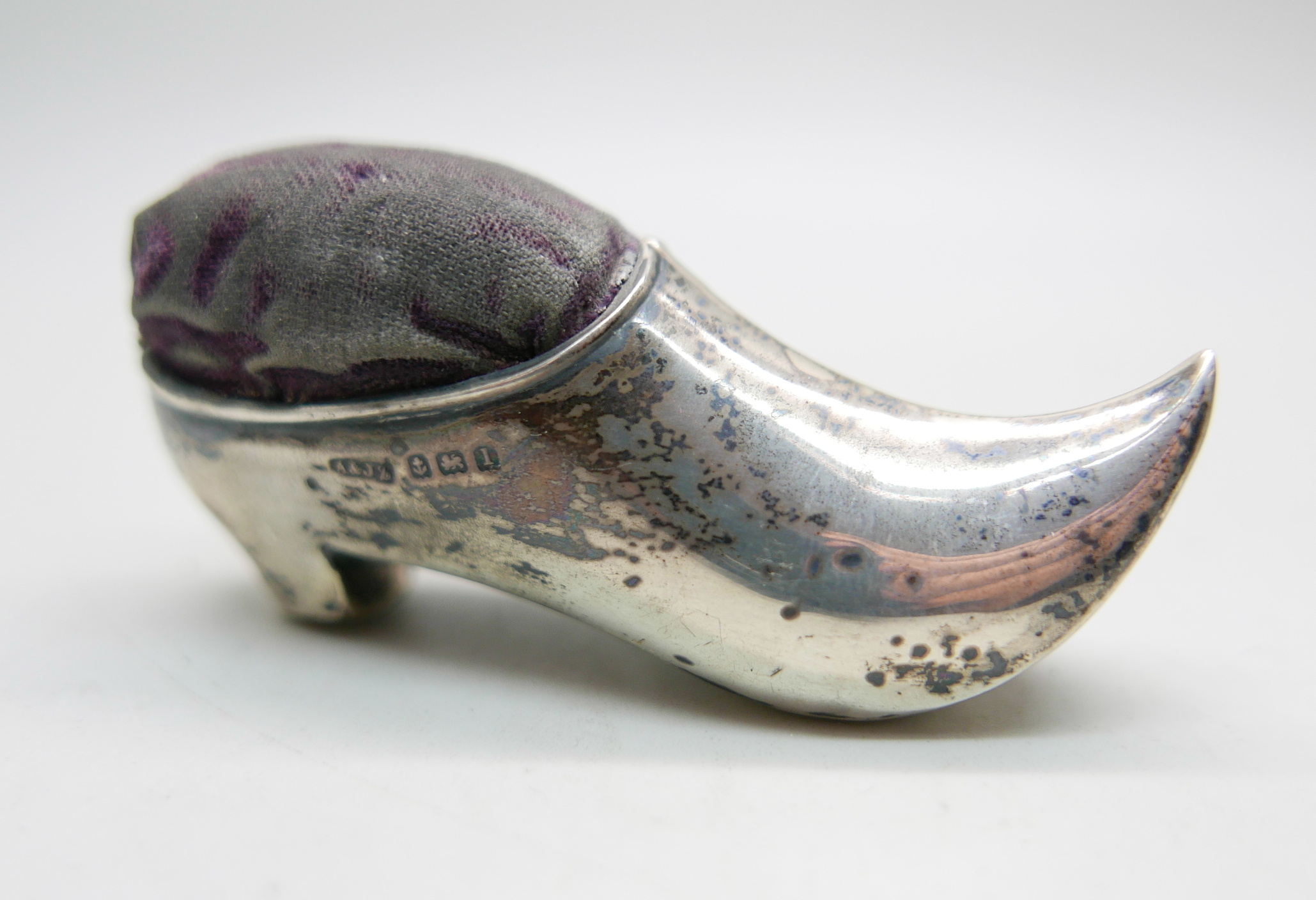 A novelty silver pin cushion in the form of a clog, Birmingham 1911