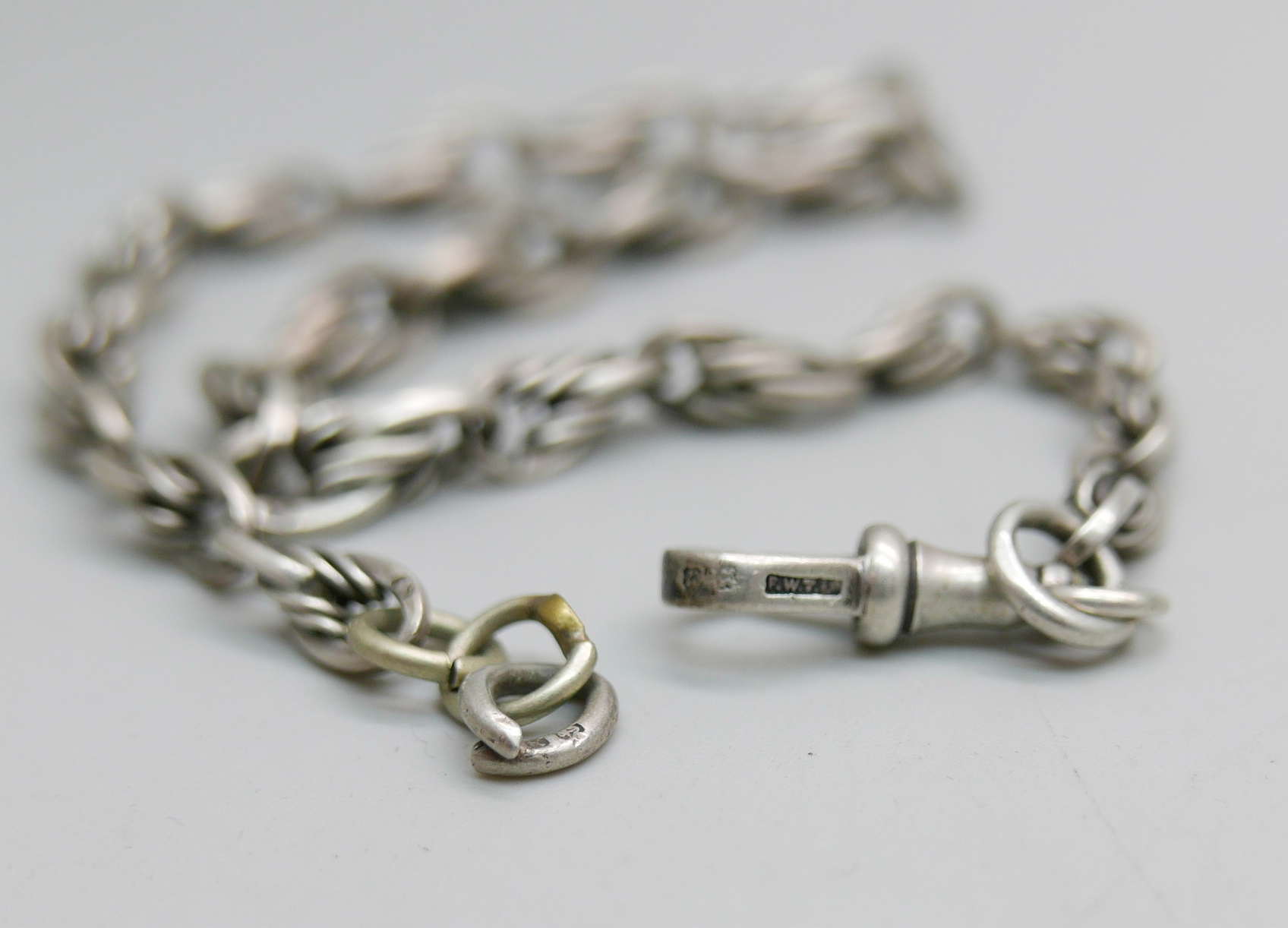 A silver fancy link watch chain with Albert clip, each link marked, and a hallmarked silver swivel - Image 2 of 5