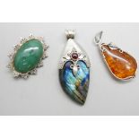 A Victorian silver and jade brooch, Birmingham 1884, a silver and amber pendant and a silver and