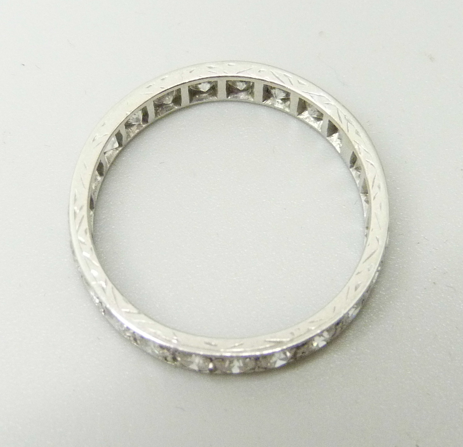 A white metal eternity ring set with approximately 2ct of diamonds, 3.2g, P - Image 3 of 3