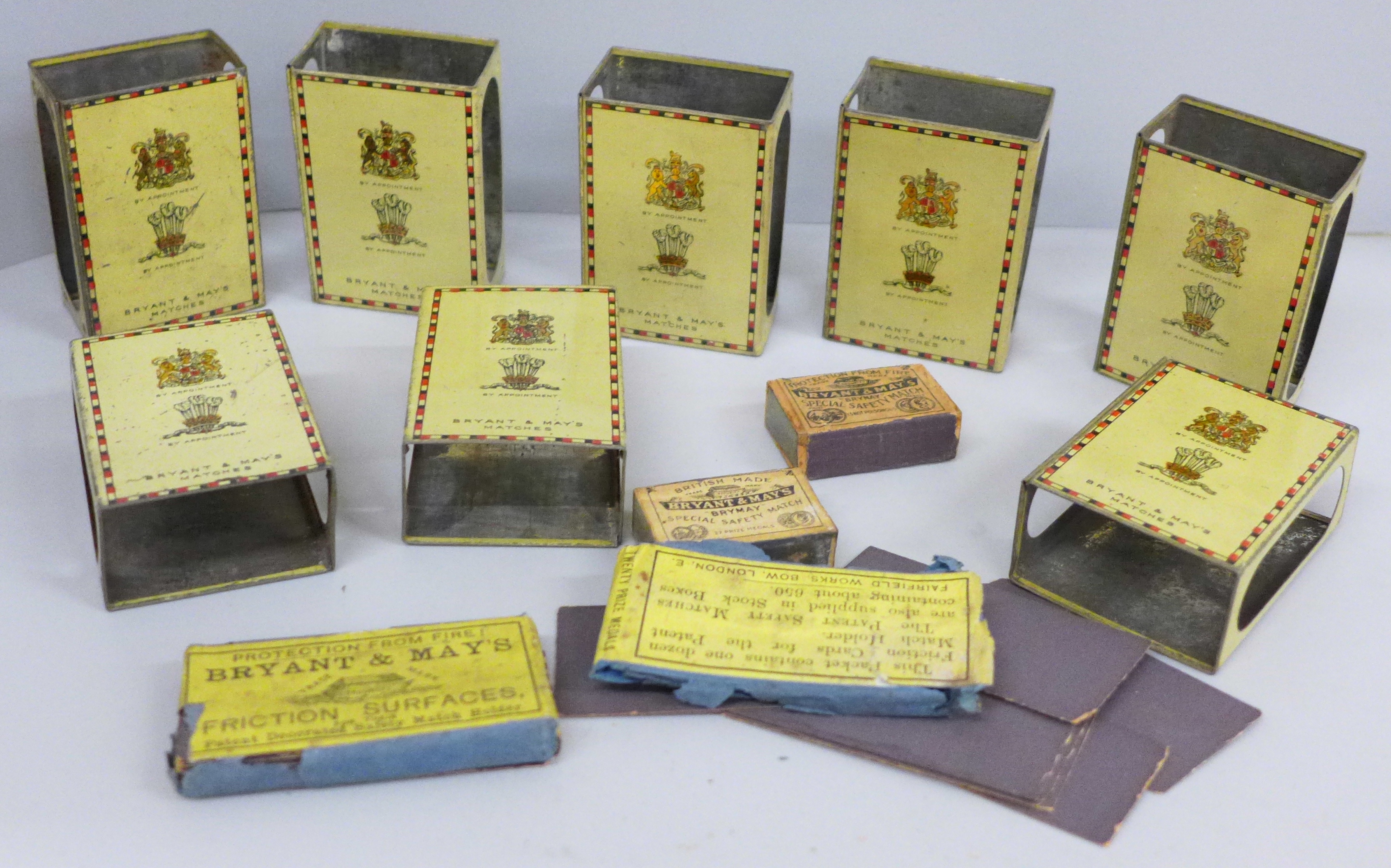 Eight Bryant & May's tin plate matchbox covers and other boxes of matches