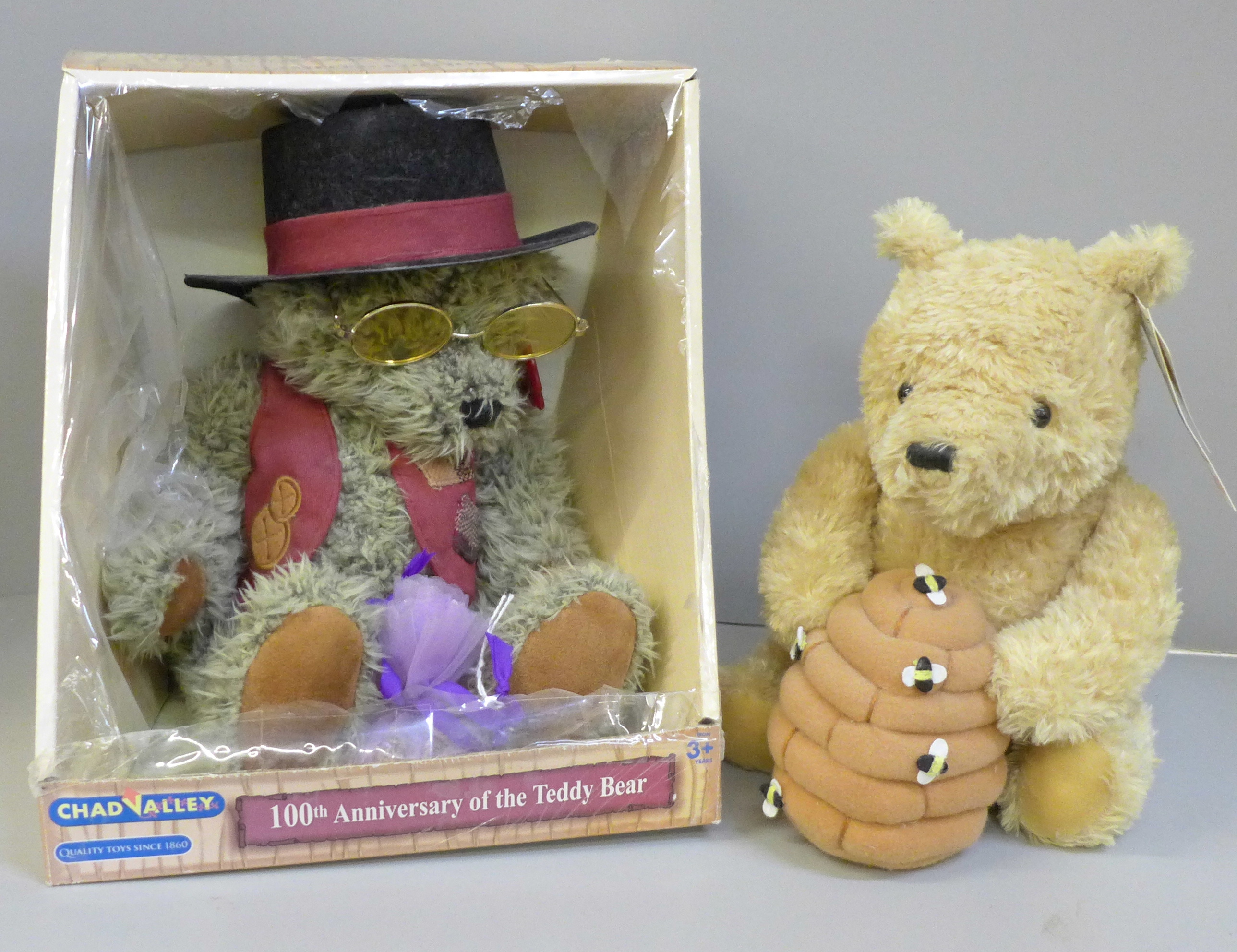 A musical Winnie the Pooh bear and a Chad Valley 100th Anniversary of the Teddy Bear bear in box