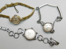 Three lady's Omega wristwatches