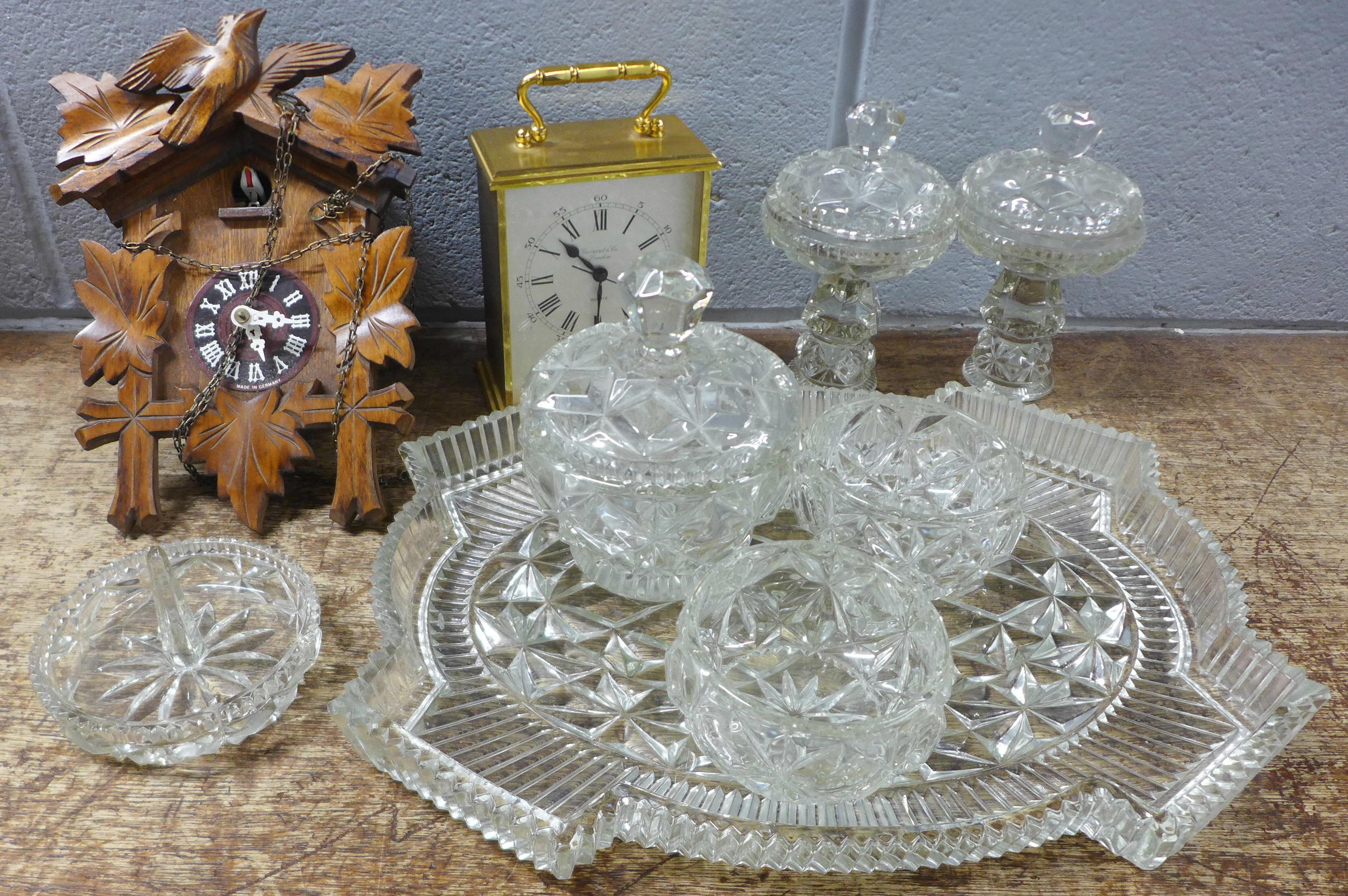 A vintage glass dressing table set, a cuckoo clock and a Garrard quartz table clock **PLEASE NOTE