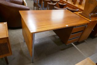 A teak and chrome desk