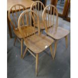A set of four Ercol Blonde elm and beech Windsor chairs