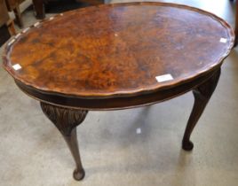 A Queen Anne style burr walnut oval coffee table