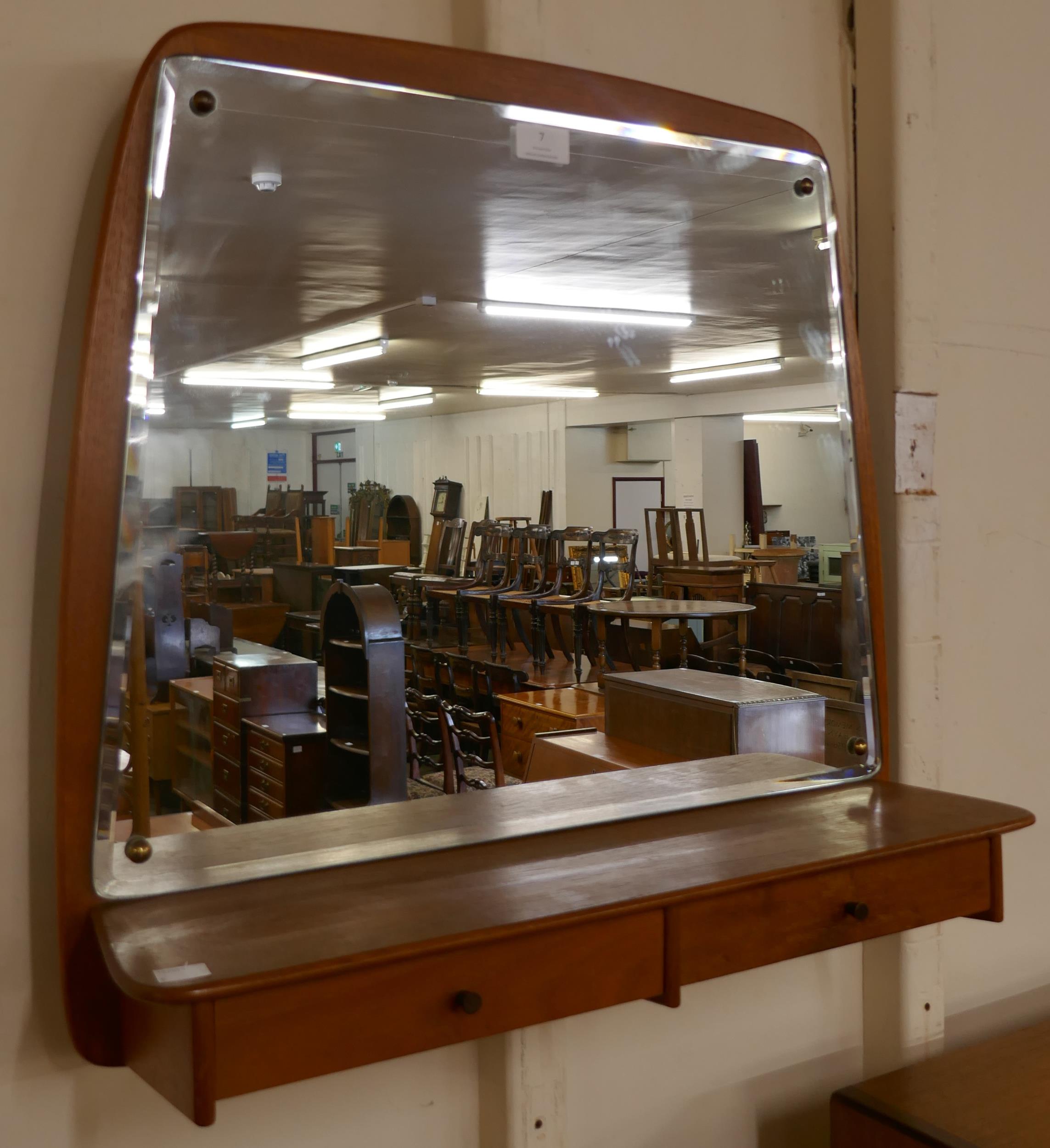 A Danish teak two drawer hall mirror