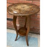A Liberty & Co. Japanese range carved wood occasional table