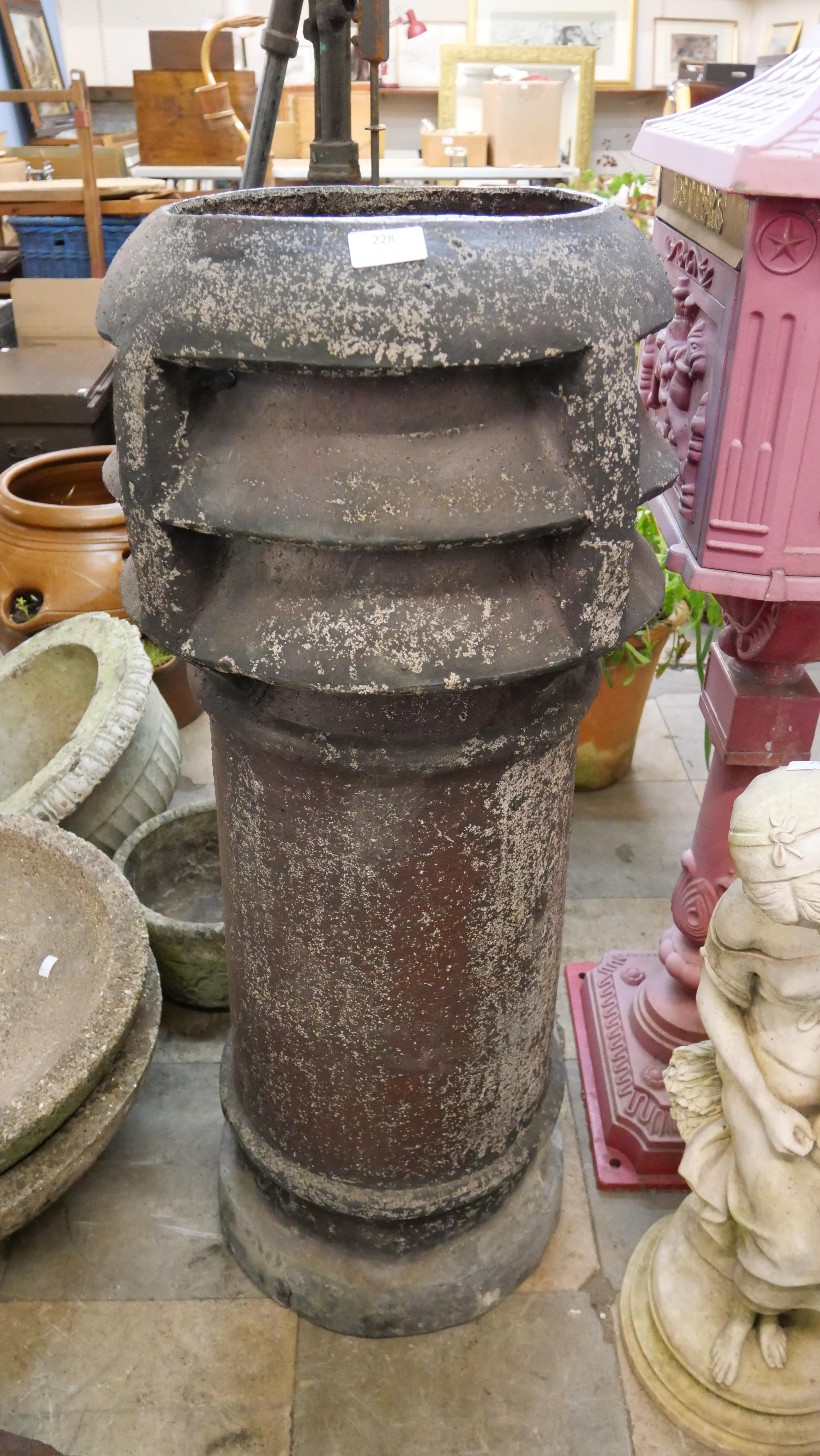 A Victorian terracotta chimney-pot