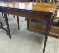 A Regency style inlaid mahogany rectangular fold over card table