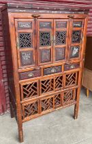 A Chinese bamboo marriage cupboard