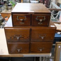 Two oak index drawer cabinets