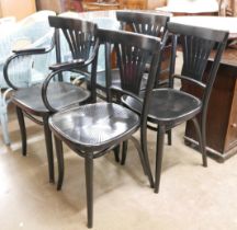 A set of four ebonised bentwood chairs