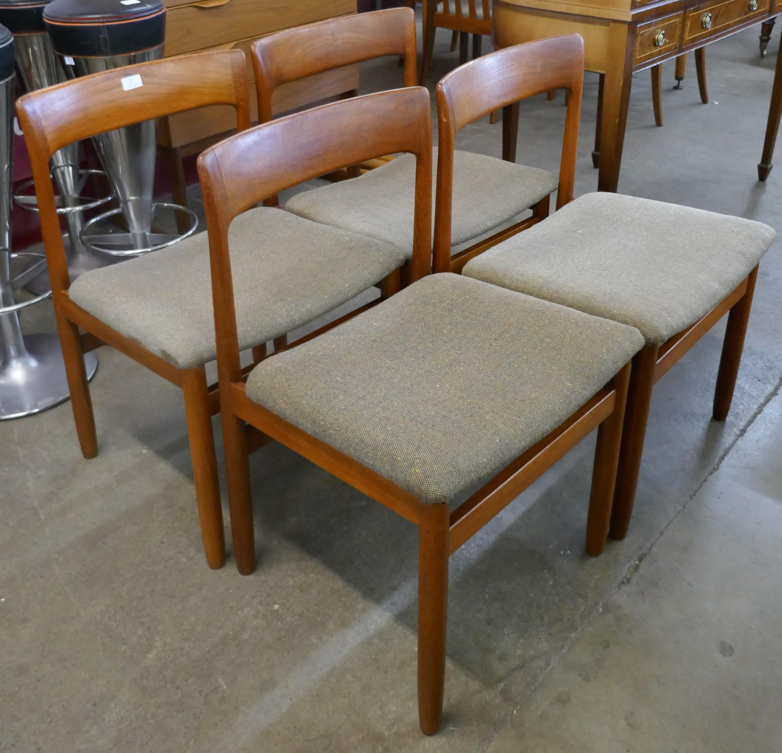 A set of four Danish teak dining chairs
