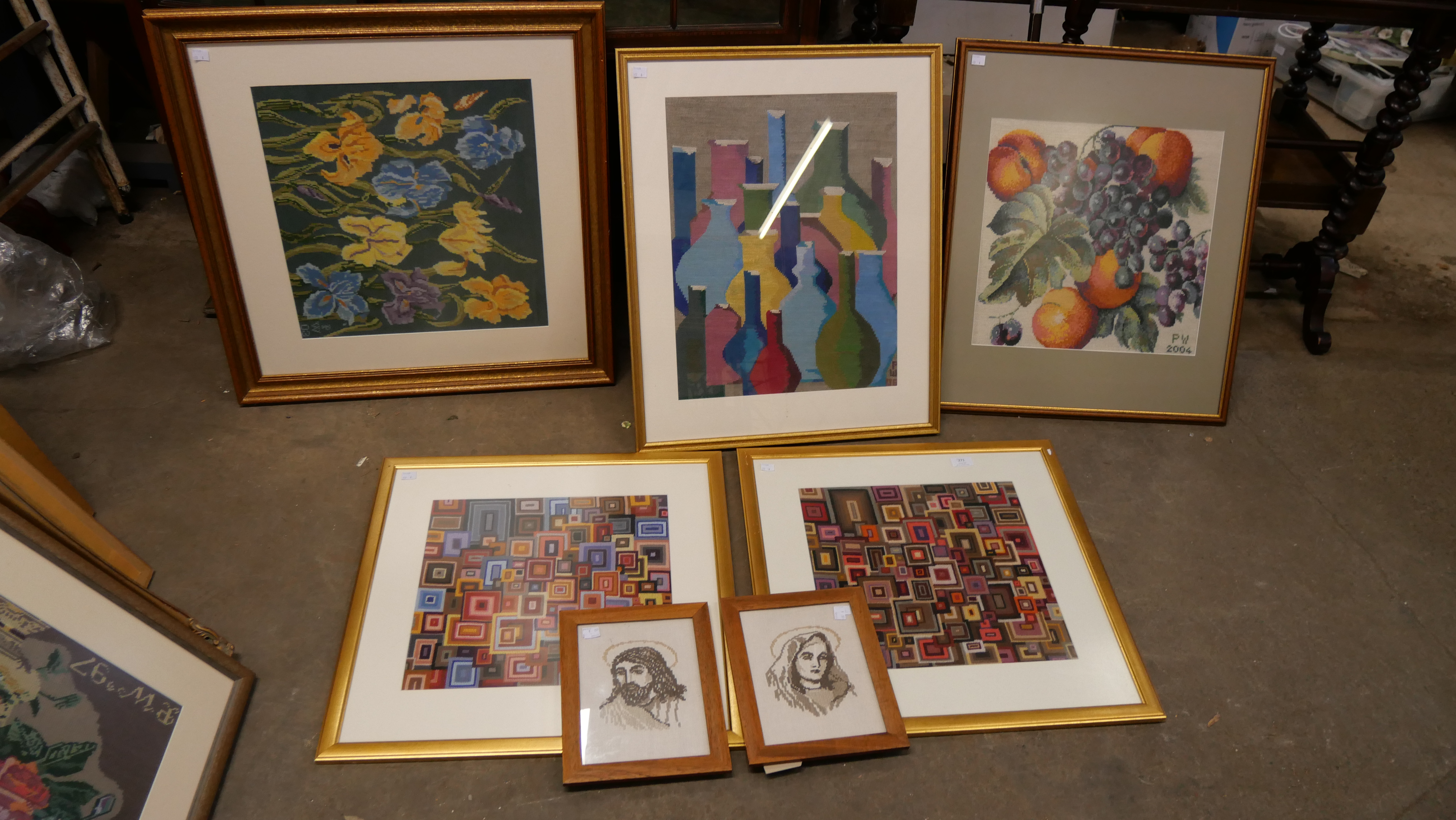 Six framed tapestries