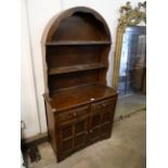 A carved oak dresser