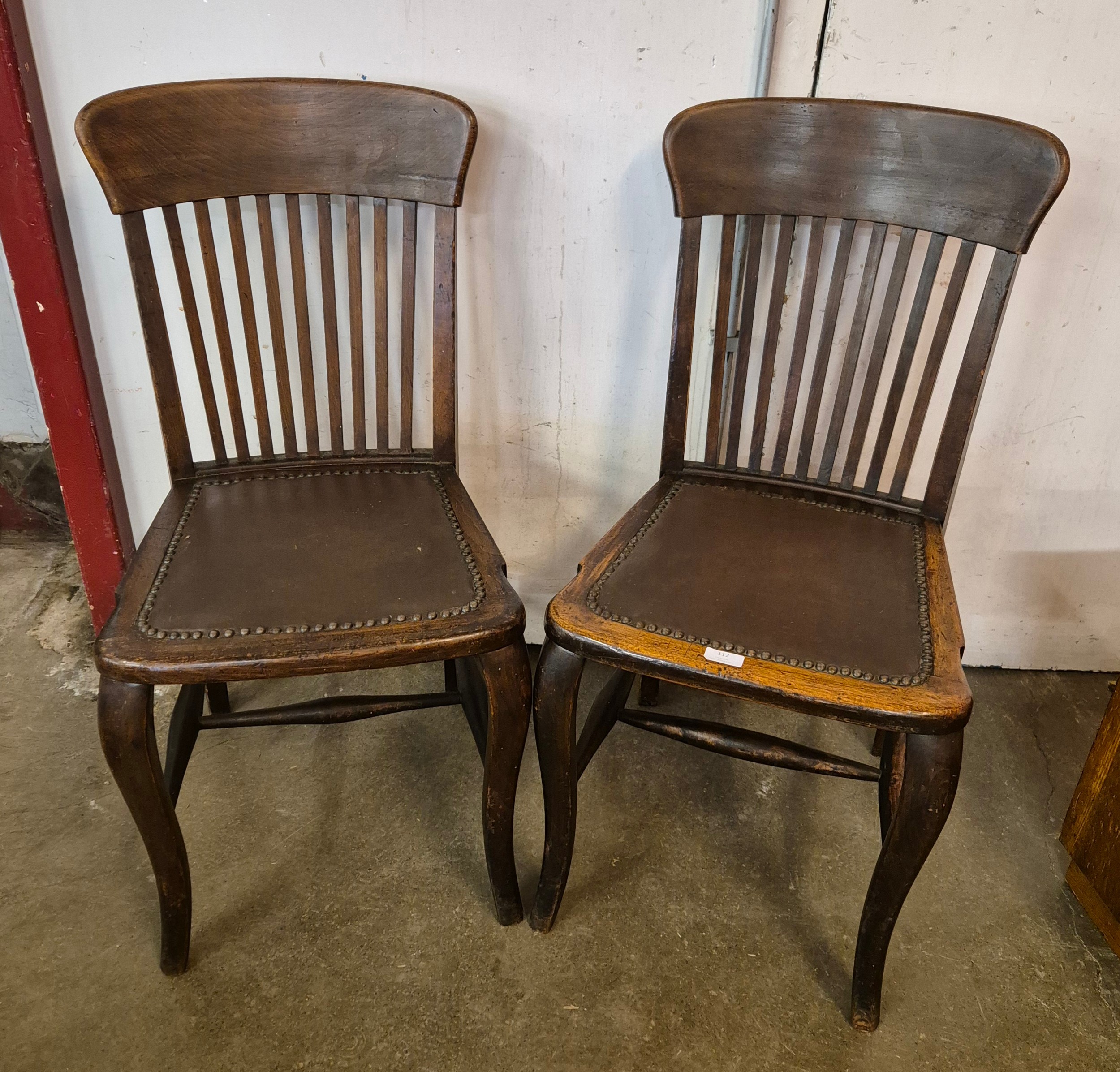 A pair of Edward VII beech desk chairs