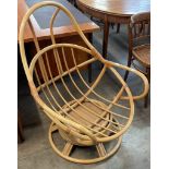 An Italian style bamboo revolving lounge chair