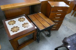 A small oak effect chest of drawers and two nests of tables