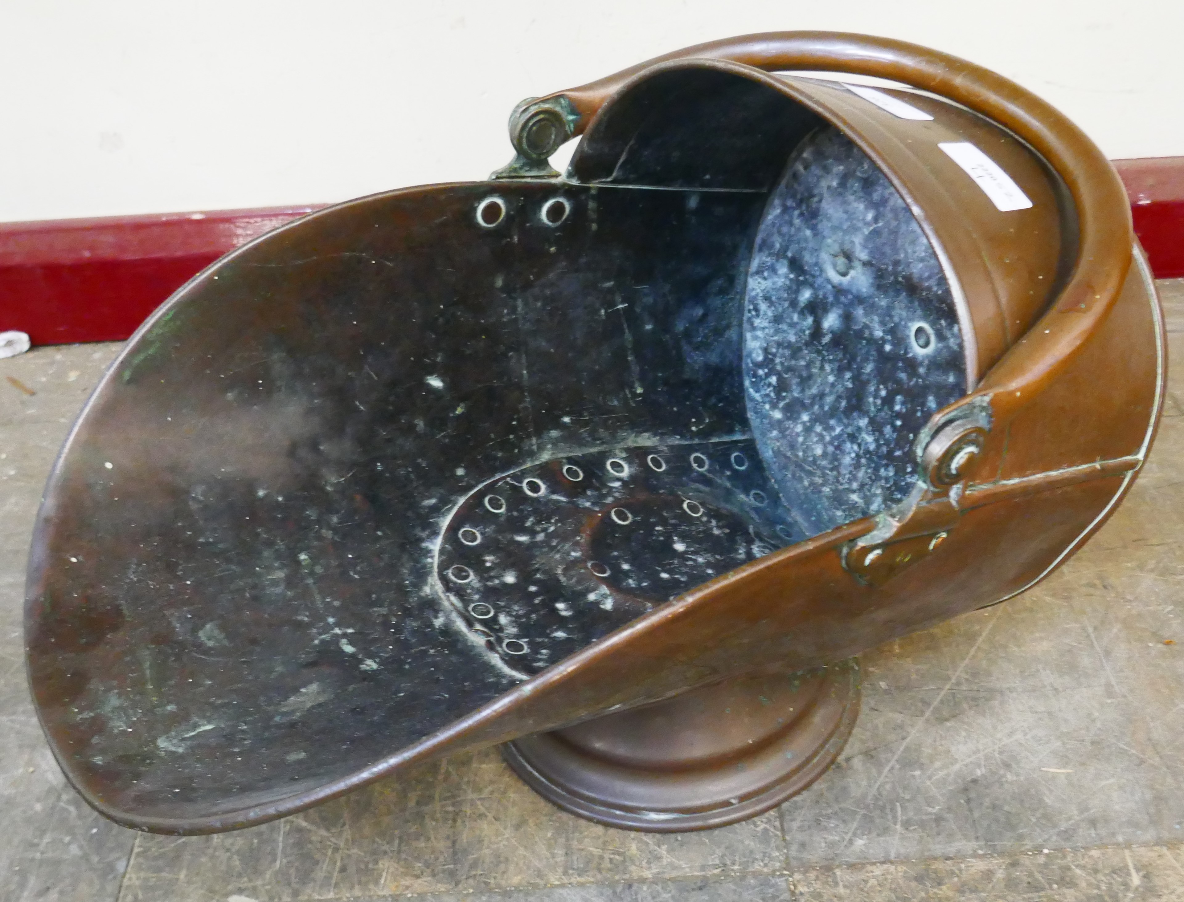A Victorian copper coal scuttle