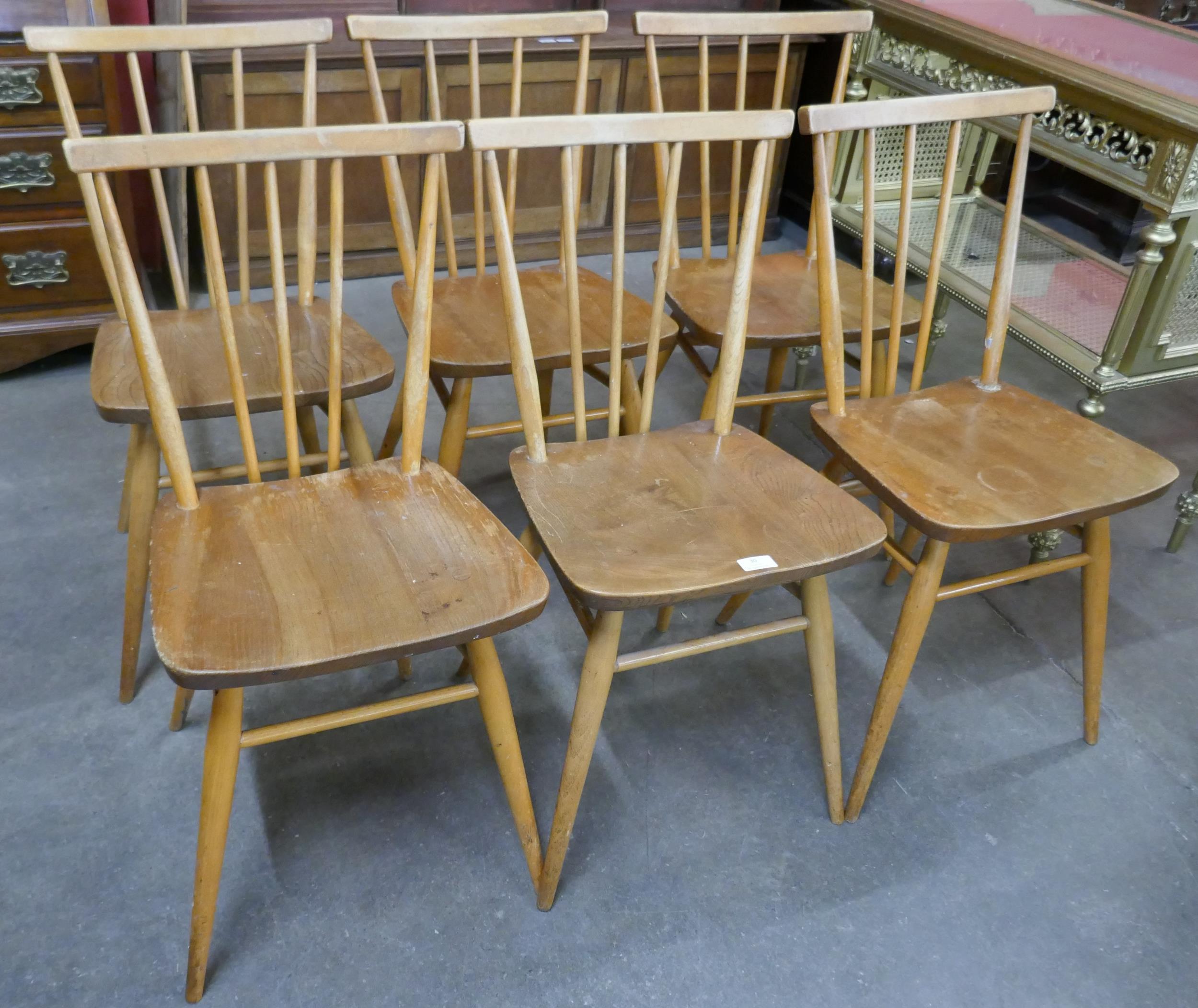 A set of six Ercol Blonde elm and beech 391 model chairs