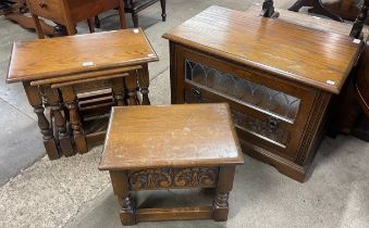 An Old Charm oak TV unit, a nest of tables and sewing box