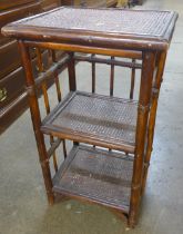 A bamboo and rattan three tier etagere