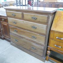 An Edward VII walnut chest of drawers