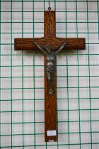 A French oak and metal wall hanging crucifix