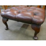 A brown leather Chesterfield footstool