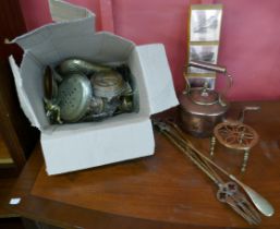 A collection of metalware including brass and copper